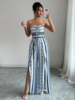 👗 60% DE RÉDUCTION 💥 Combinaison motifs géométriques – Encolure dos nu & fente latérale – Tissu fluide, polyvalente – parfaite pour les soirées ou les vacances ✨