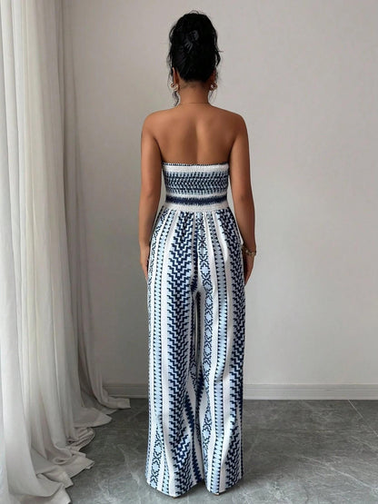 👗 60% DE RÉDUCTION 💥 Combinaison motifs géométriques – Encolure dos nu & fente latérale – Tissu fluide, polyvalente – parfaite pour les soirées ou les vacances ✨