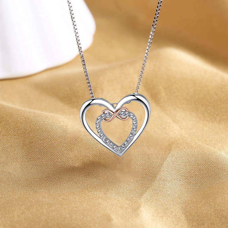 🎁💕 À offrir à votre bien-aimé(e)💕 Collier à double cœur à la mode