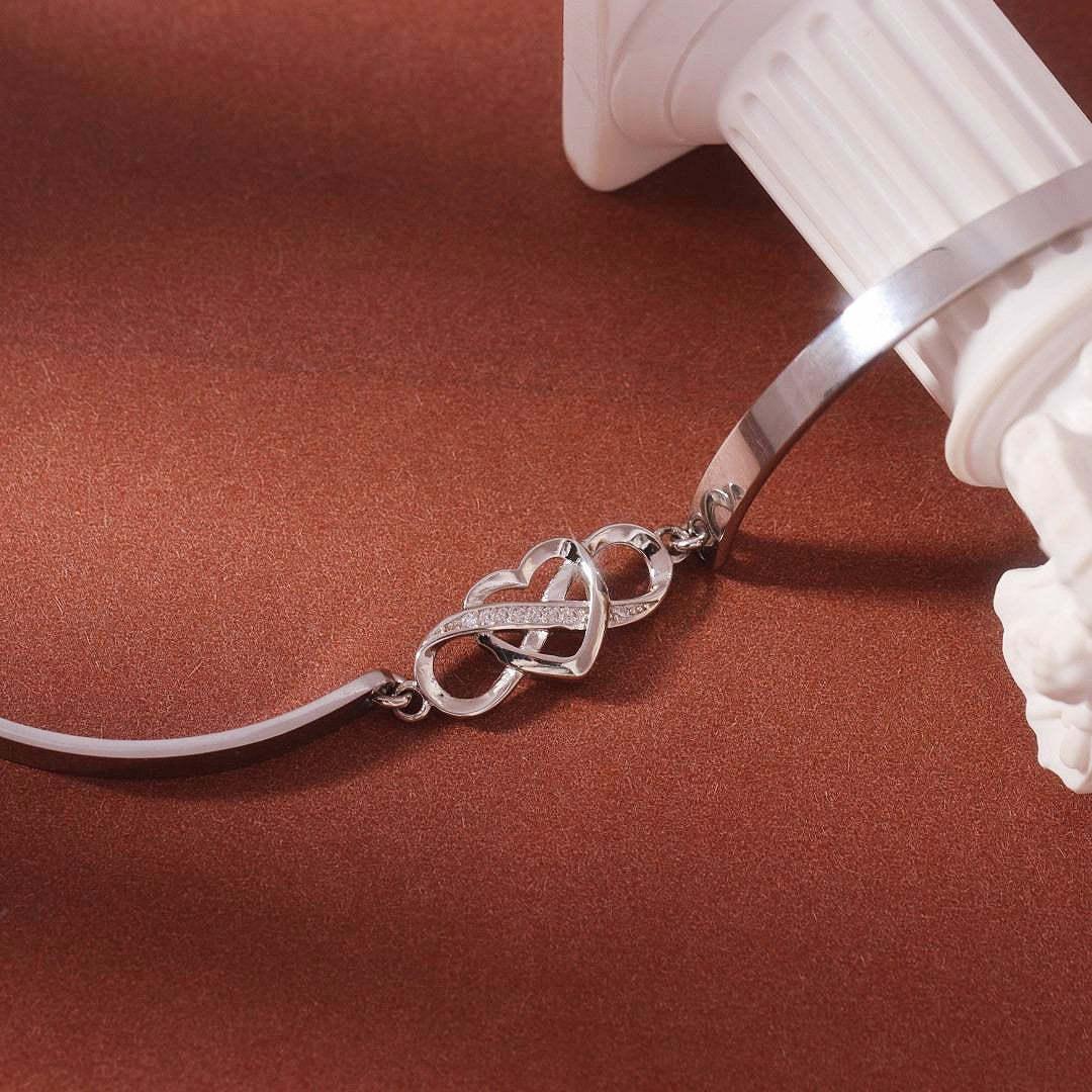 POUR MA FILLE ADOPTIVE - BRILLE TOUJOURS COMME L'ÉTOILE LA PLUS BRILLANTE BRACELET INFINITY