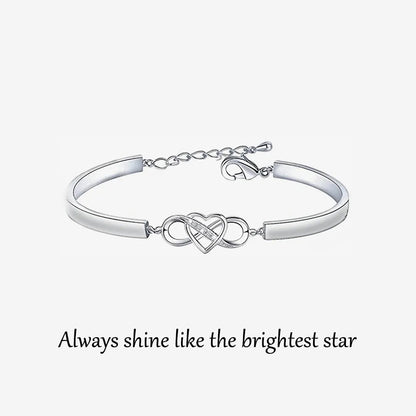 POUR MA FILLE ADOPTIVE - BRILLE TOUJOURS COMME L'ÉTOILE LA PLUS BRILLANTE BRACELET INFINITY