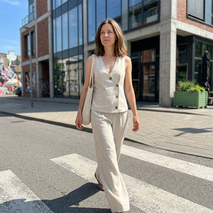 💃 Elegant väst-set med vida ben – asymmetrisk knapprad, smickrande siluett & luftig passform, perfekt för både fest & vardag 🌿
